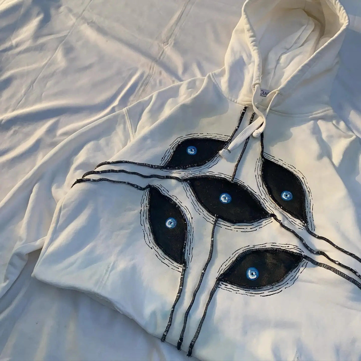 Dark Eye Embroidered Hoodie