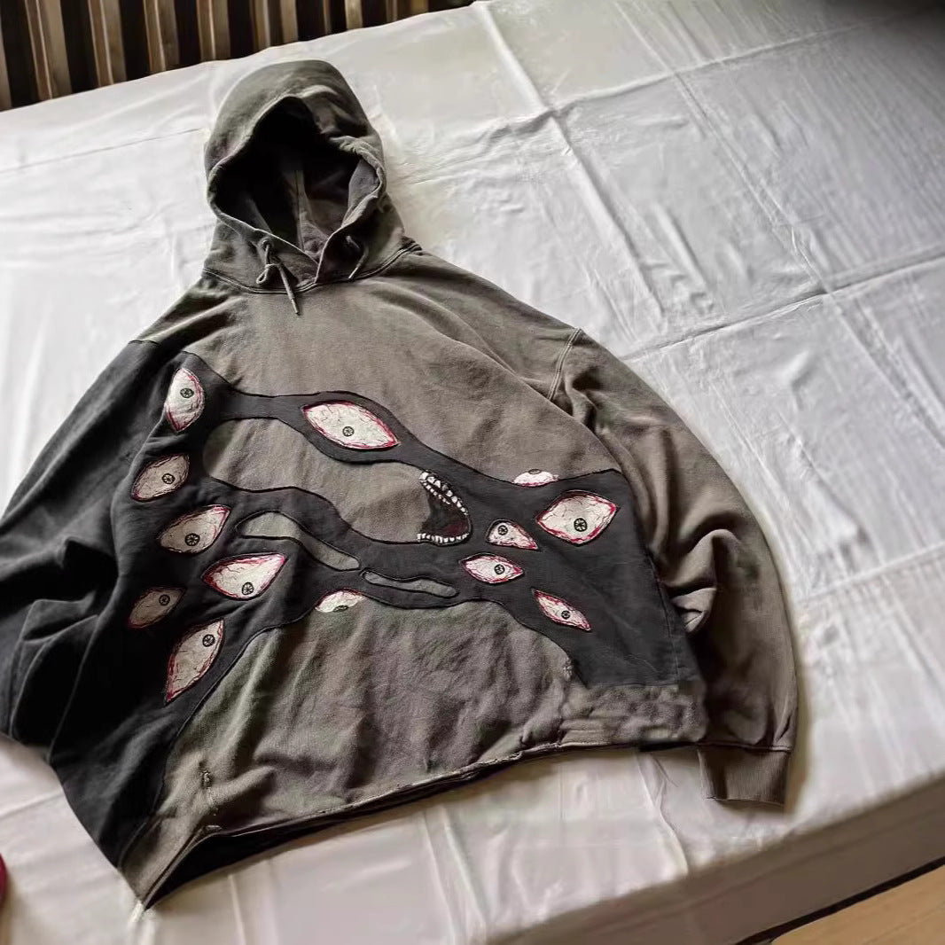 Dark Eye Embroidered Hoodie